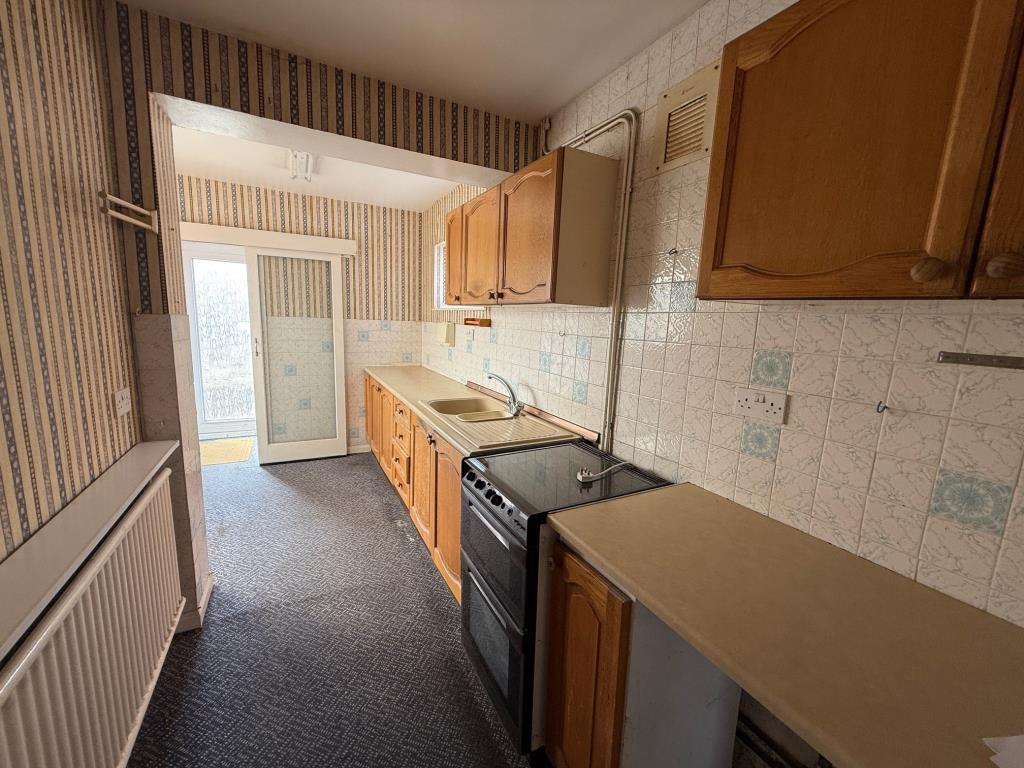 Lot: 149 - SEMI-DETACHED HOUSE FOR IMPROVEMENT IN POPULAR RESIDENTIAL AREA - Kitchen with door to rear lobby and cloakroom/WC